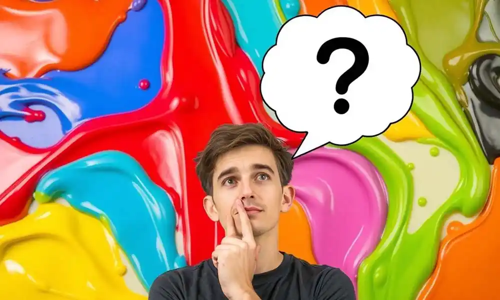 A young man ponders in front of a vibrant liquid paint background, with a question mark above his head, representing "How to Know What Kind of Paint to Use